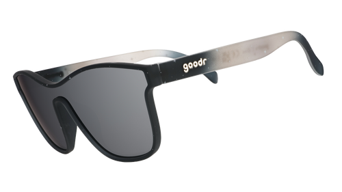 Three-quarter view of translucent black and gray ombre VRG frames featuring a cosmos design and chrome reflective lens.