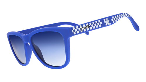 Three-quarter angle view of blue and white checkered sunglasses featuring blue gradient lenses and the University of Kentucky logo.