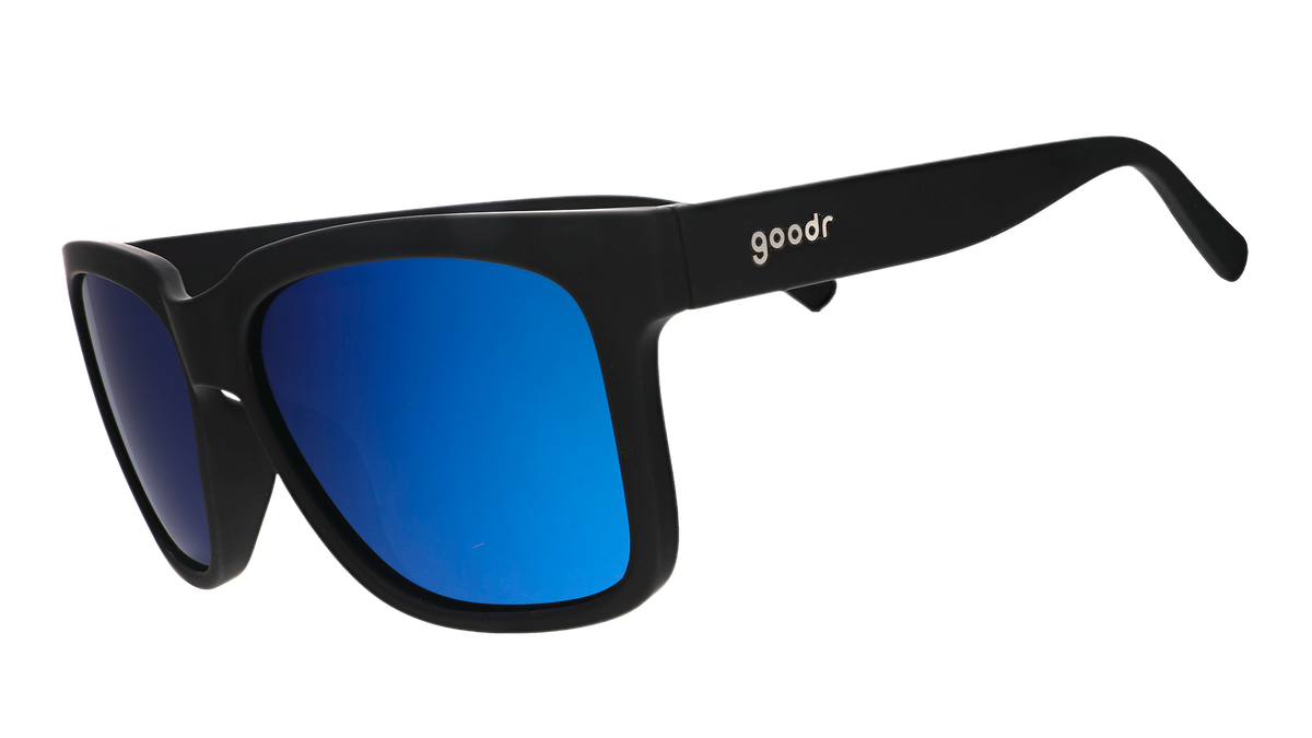 Three-quarter angle view of black sunglasses with blue lenses designed to float in water.