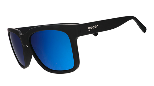 Three-quarter angle view of black sunglasses with blue lenses designed to float in water.