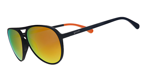 Three-quarter angle view of black aviator sunglasses with amber lenses.