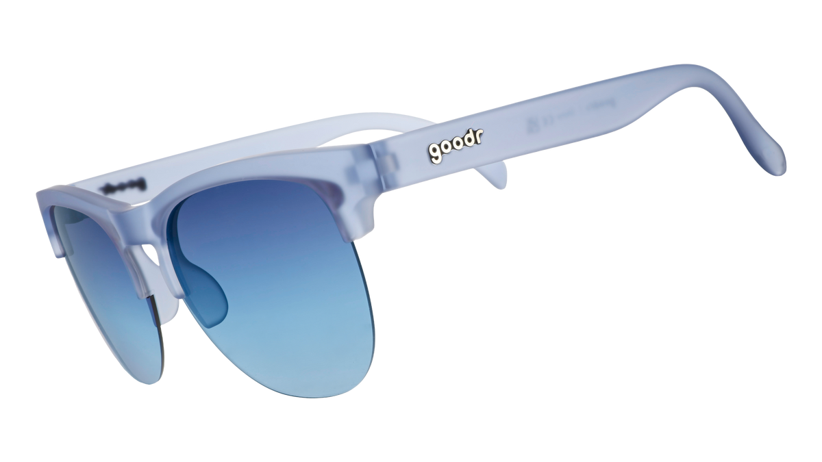Three-quarter angle view of dusty blue translucent Avant Gs with blue gradient lenses.
