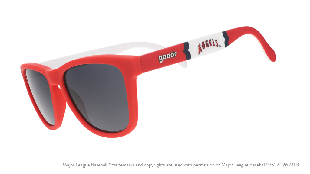 Three-quarter angle view of a pair of red, white, and blue sunglasses featuring the Angels' "halo A" logo on the arm. 