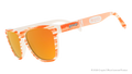 Side view of Crayola goodr UV-activated Party Fish sunglasses with bone-to-magenta frames and amber reflective lenses.
