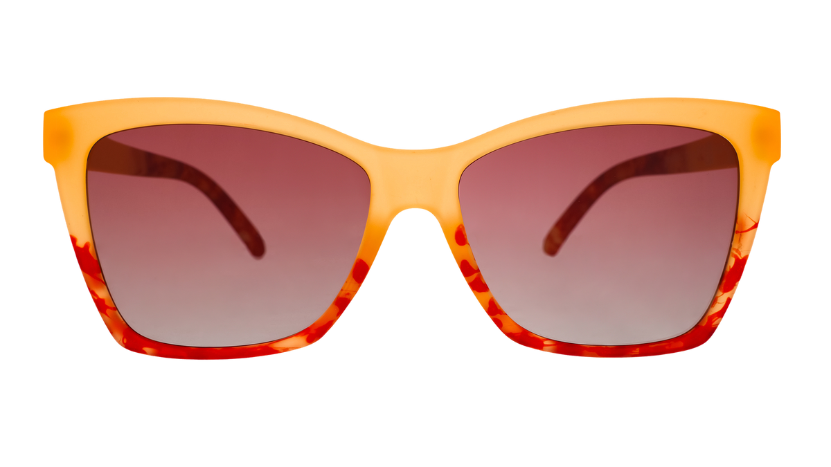 Front view of translucent yellow-orange sunglasses with red hand-painted whirls & rose ocean gradient lenses.