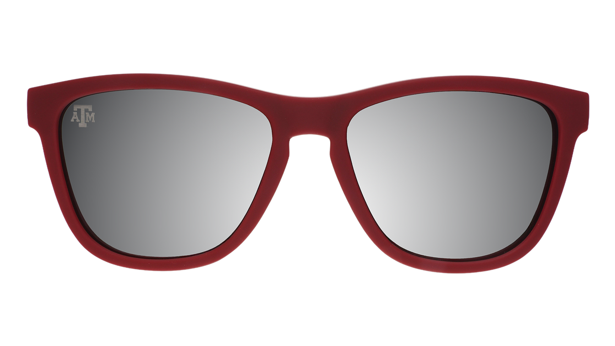 Front view of Texas A&M® Aggies™ sunglasses with a burgundy front frame and chrome lenses.