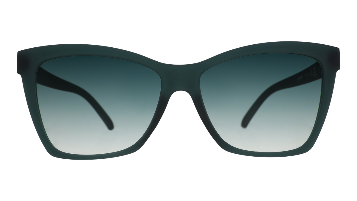 Front view of a pair of angular, translucent teal Pop Gs with green gradient lenses.