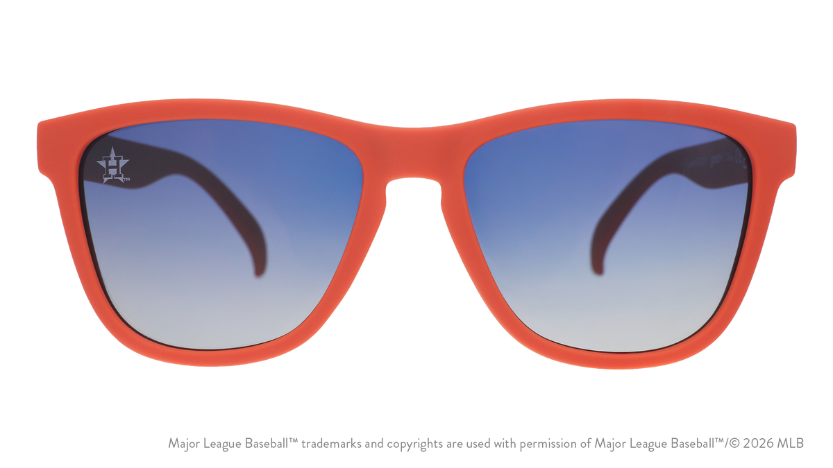 Front view of Astros shades with orange faceplate. Blue gradient lenses have the Lone Star H logo etched on the left lens.