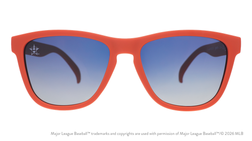 Front view of Astros shades with orange faceplate. Blue gradient lenses have the Lone Star H logo etched on the left lens.