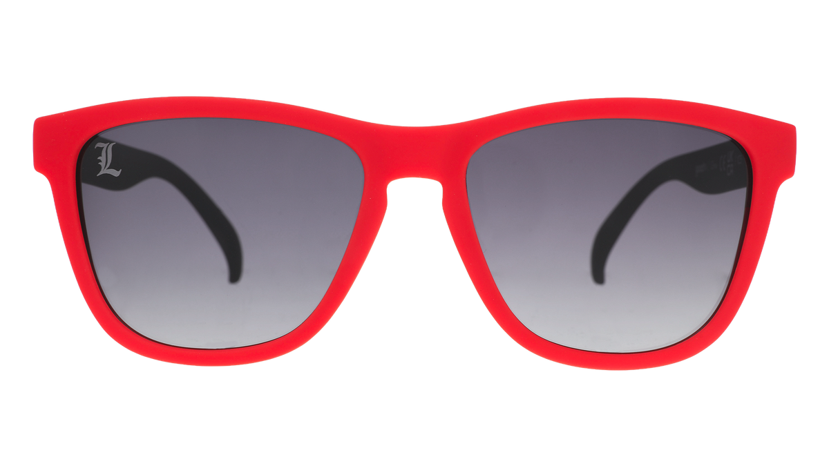 Front view of black and Cardinal red sunglasses featuring black gradient lenses with the Louisville “L” etched on the right lens.