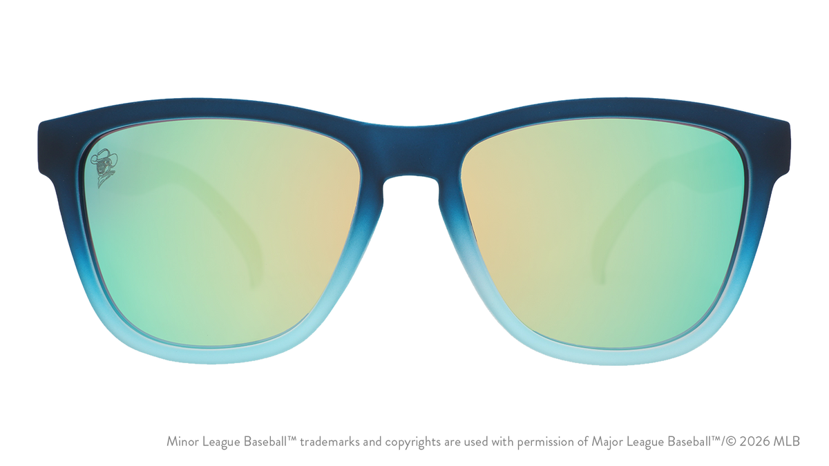 Front view of sunglasses. Blue front frame. Blue reflective lenses. Space Cowboys logo etching in top corner of lens.