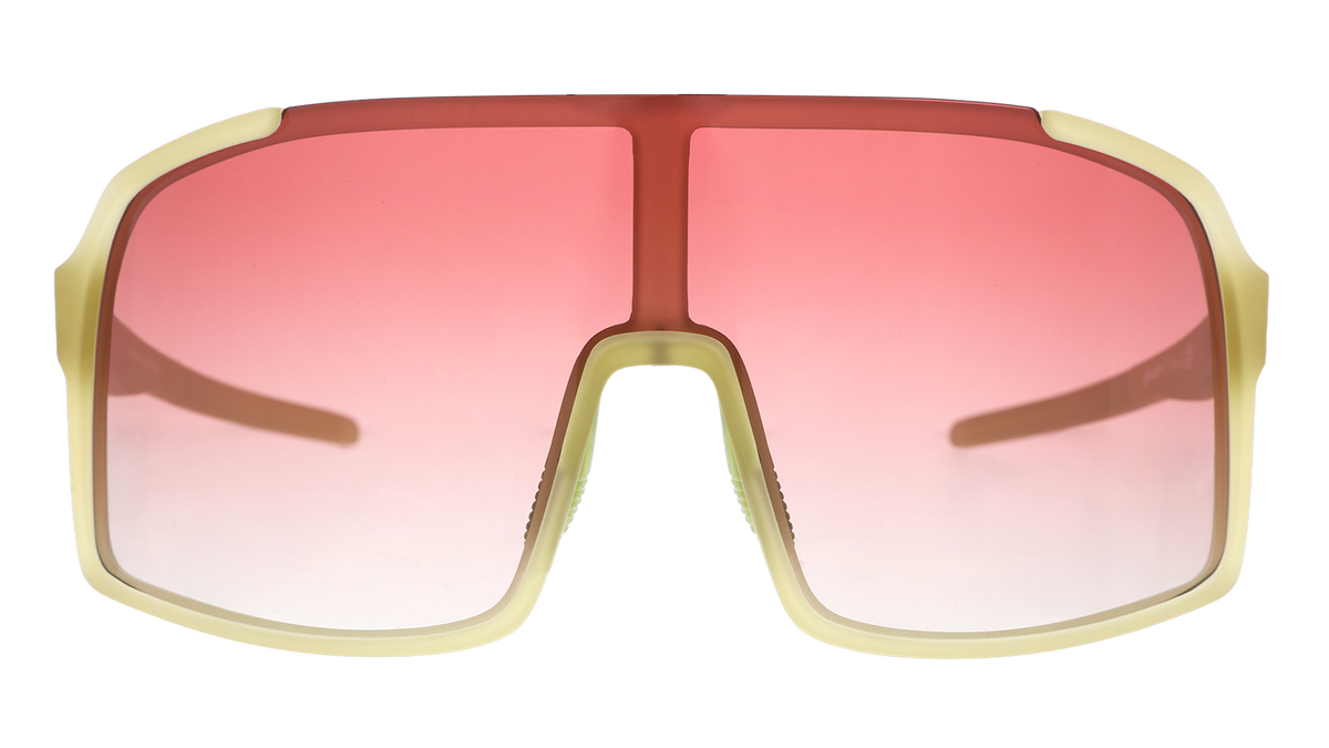 Front view of translucent chartreuse wrap sunglasses with a rose gradient shield lens.