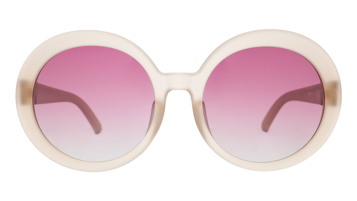 Front view of oversized round beige sunglasses with purple gradient lenses against a white background.
