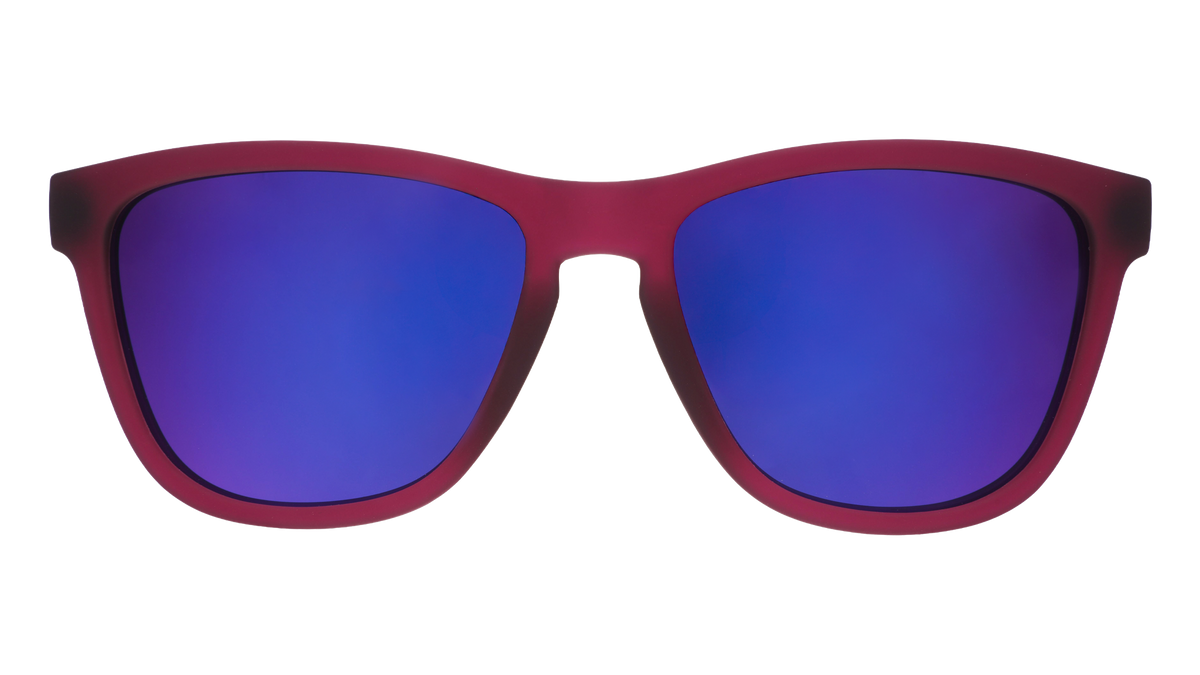 Front view of translucent purple sunglasses featuring a classic frame and reflective purple lenses.