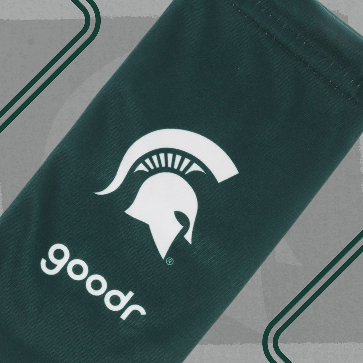 Dark green microfiber sunglasses pouch with white Michigan State and goodr logos.