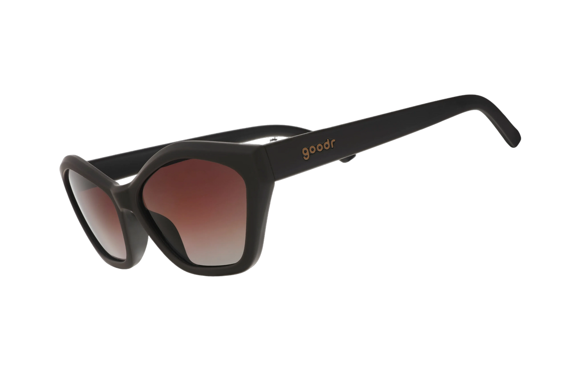 Black sunglasses with gradient lenses on a white background